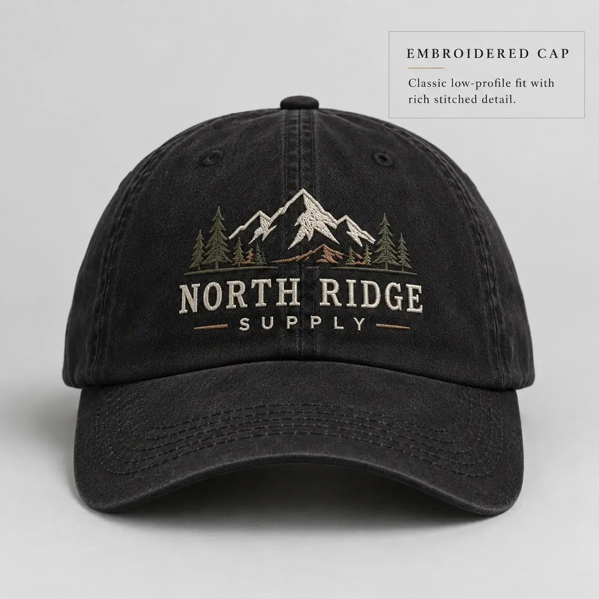 Black washed dad cap with North Ridge Supply mountain embroidery on the front.