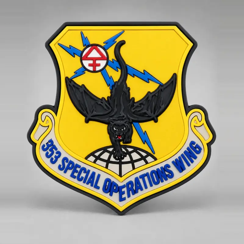Molded 3D PVC 353 Special Operations Wing shield patch with a black cat over a globe on yellow.