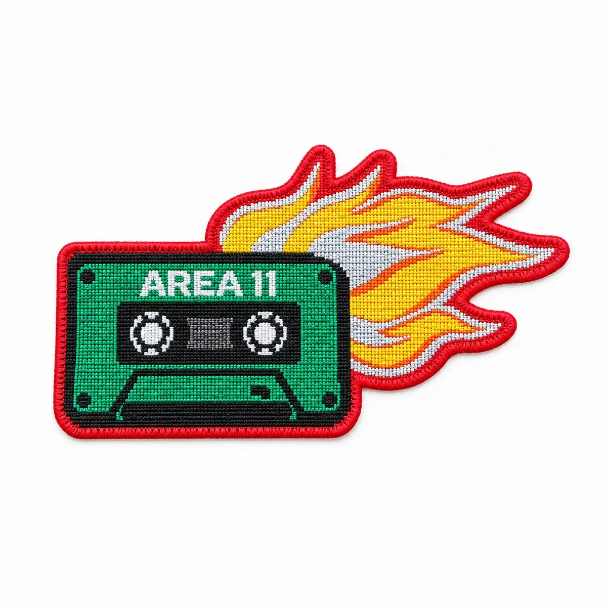 Woven Area 11 cassette tape patch trailing yellow flames.