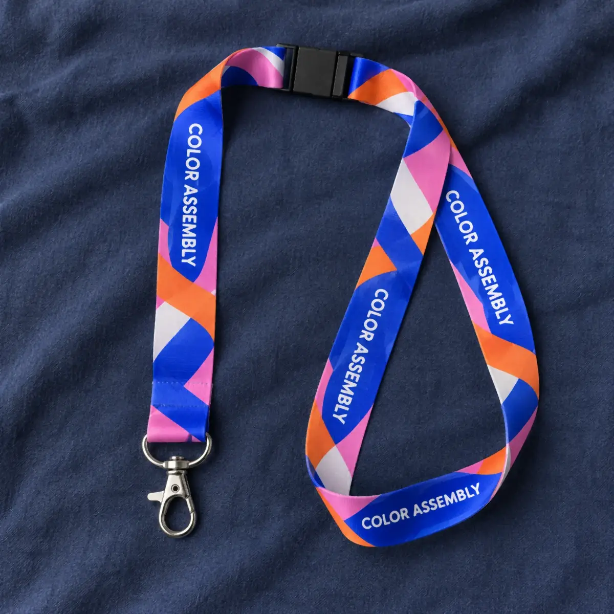 Blue, orange and pink printed Color Assembly lanyard with a swivel hook.