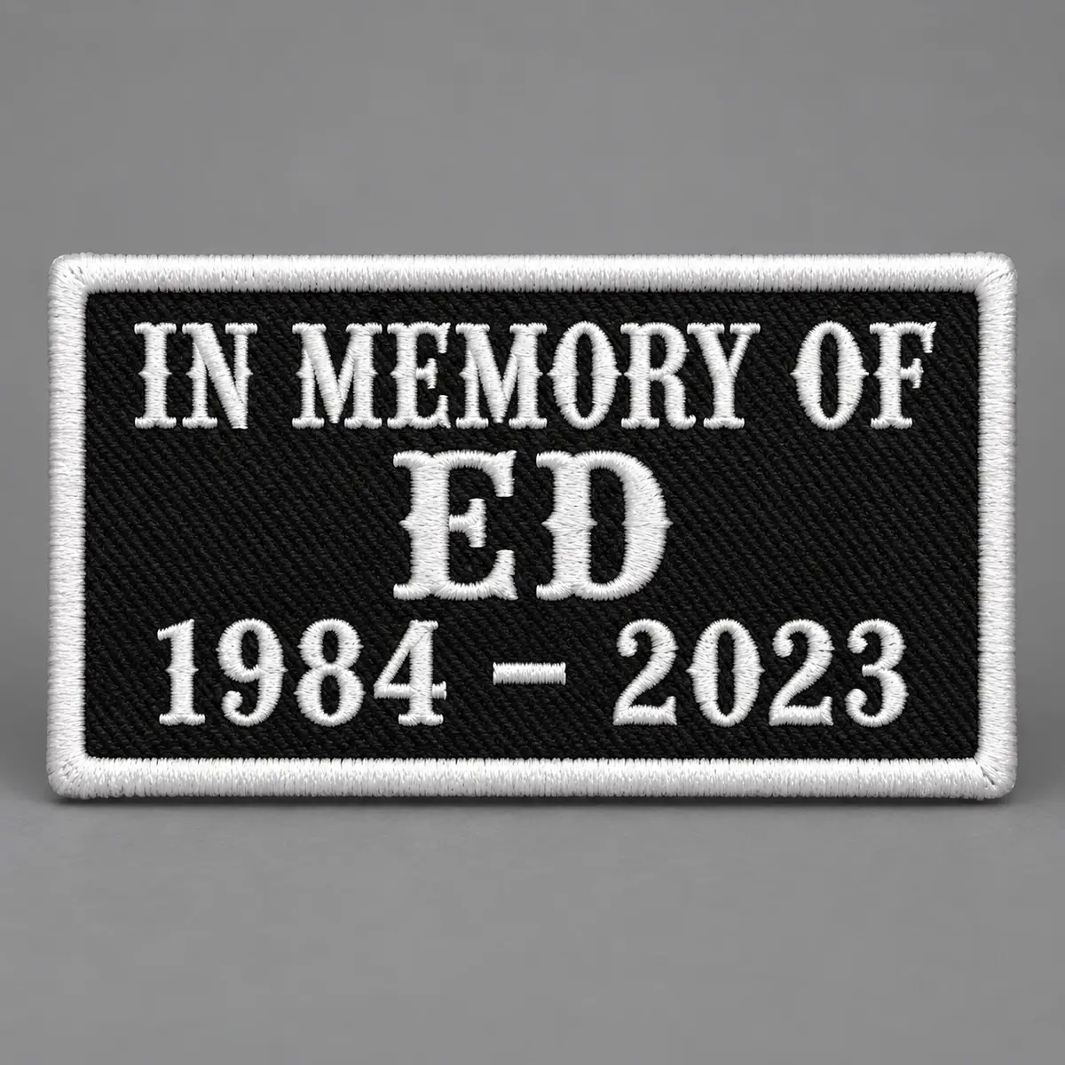 Black embroidered In Memory Of Ed 1984 - 2023 patch.