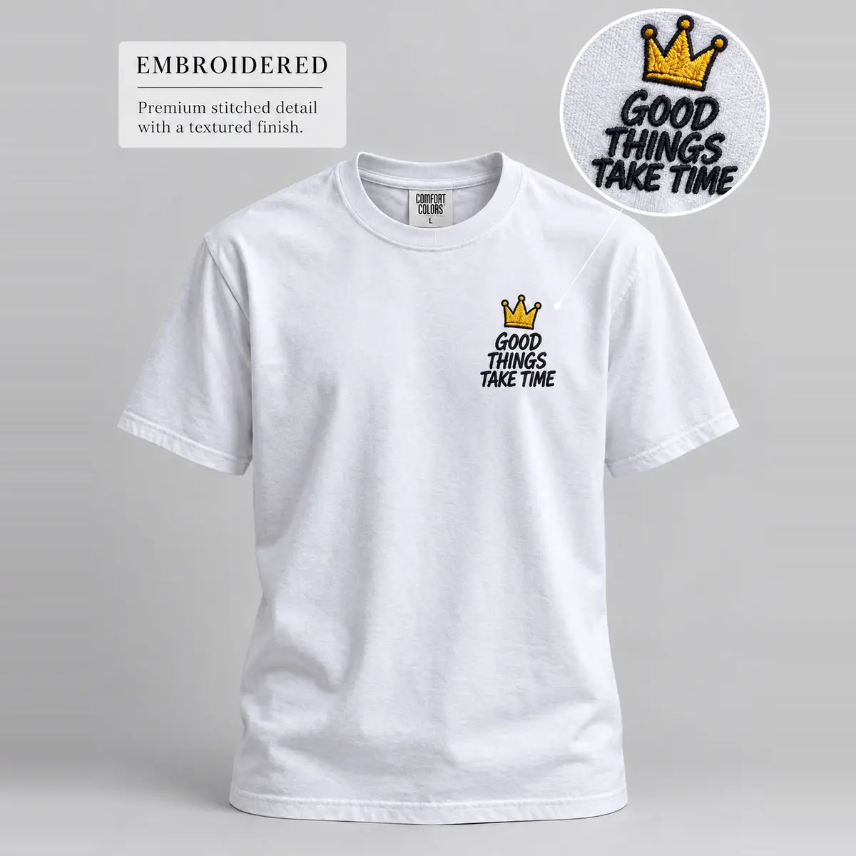 White tee with a small Good Things Take Time crown print on the chest.