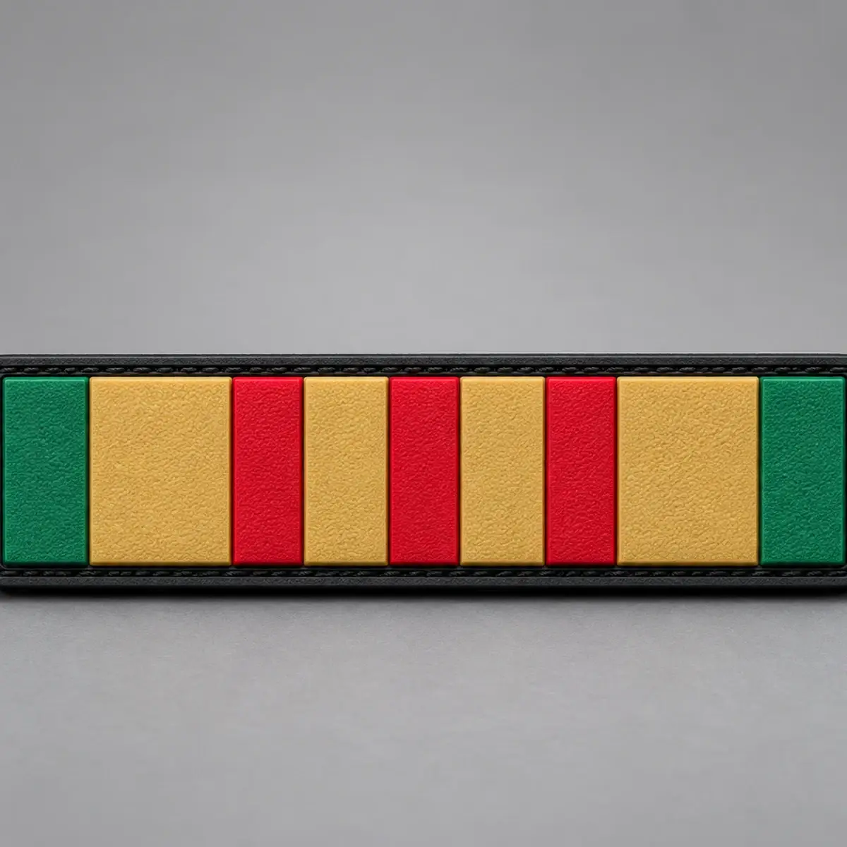 PVC service ribbon bar patch in green, gold and red stripes.