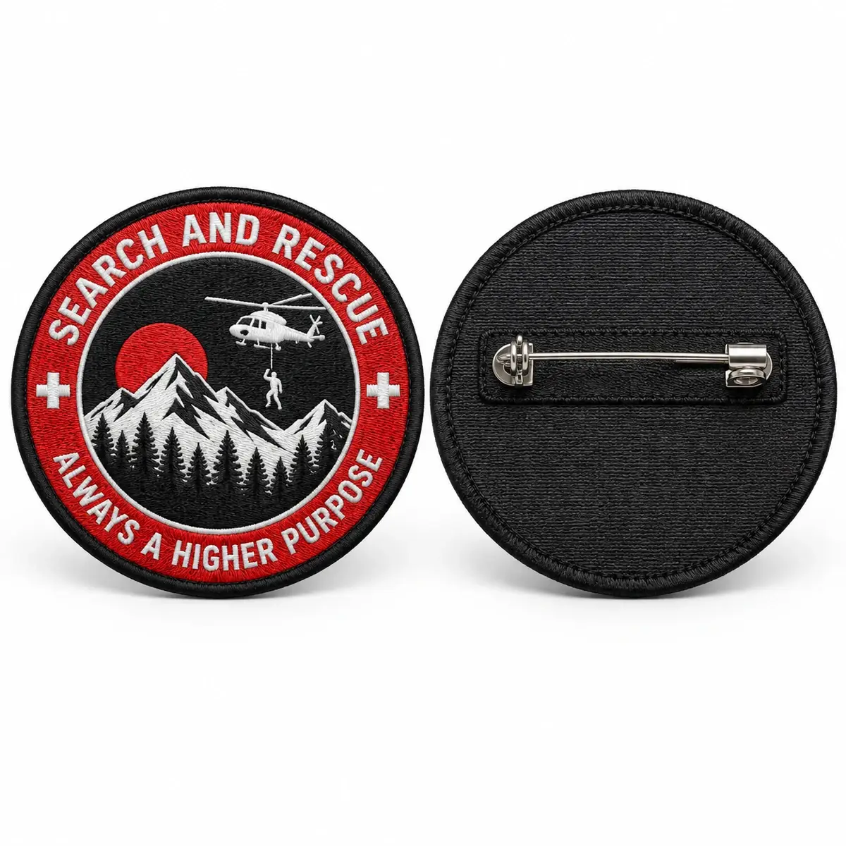 Round embroidered Search and Rescue patch beside its back with a brooch pin.
