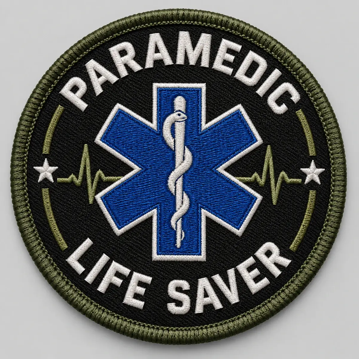 Round embroidered Paramedic Life Saver patch with a Star of Life and heartbeat line.