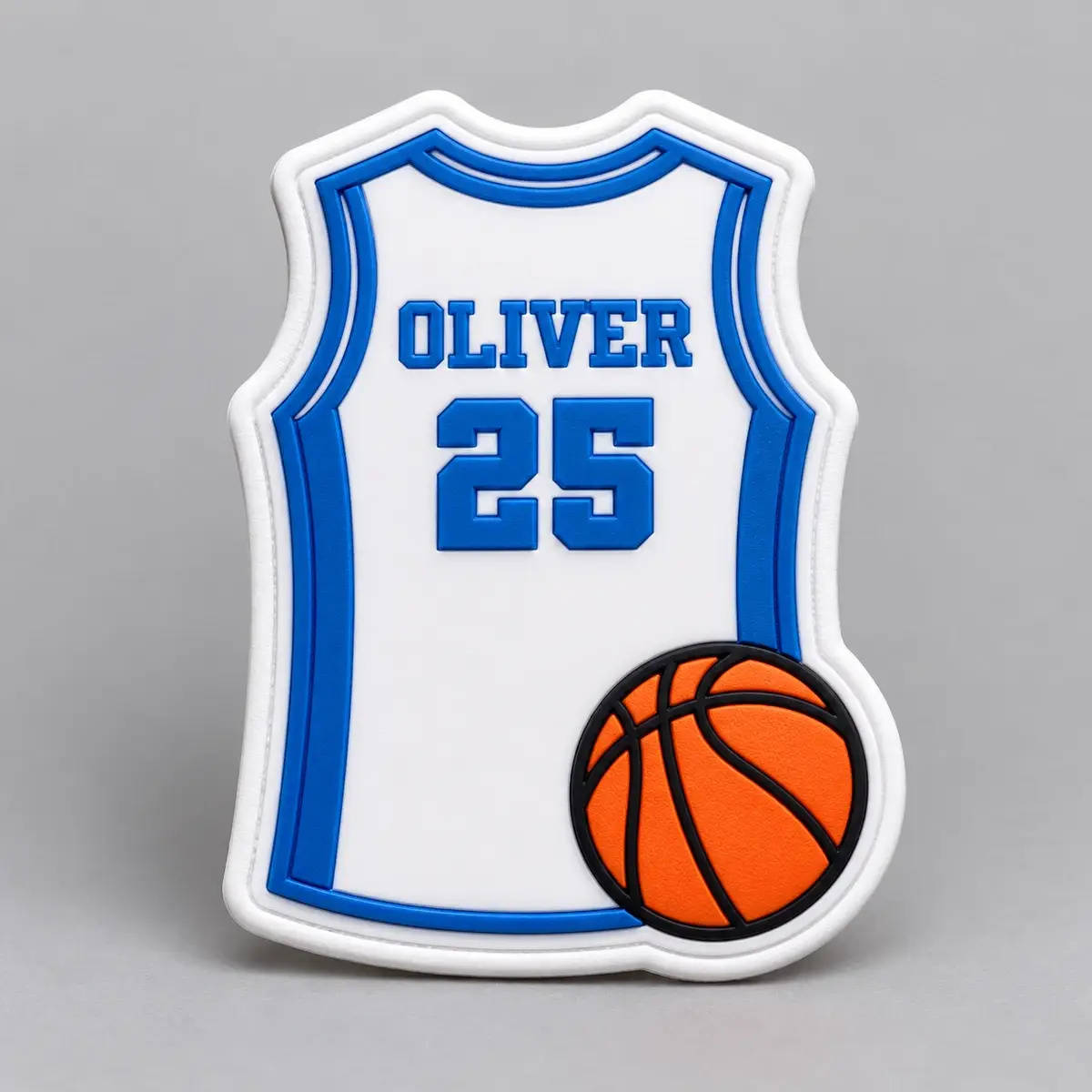 Molded PVC basketball jersey patch reading Oliver 25 with an orange ball.