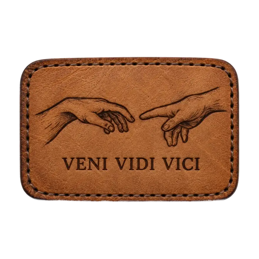 Embossed leather patch reading Veni Vidi Vici